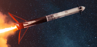 Rocket launching into space against a star-filled sky with fiery exhaust trailing behind.